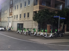 E-scooters moved away from East Melbourne corner after being “stacked” onto footpath